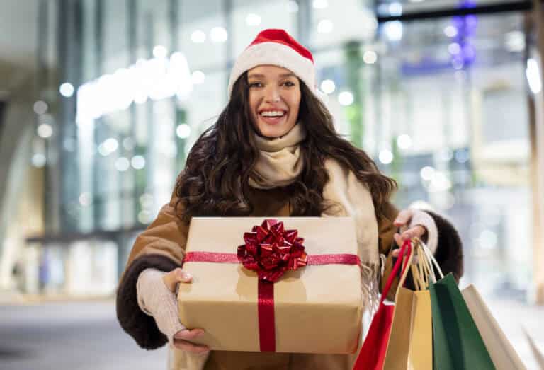 Young lady finishing up her Christmas shopping.